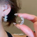 Crystal Crescent Hoop Earrings in Gold and Silver Tones view 4