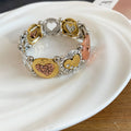 Mixed Metal Stretch Bracelets With Embossed Oval Links view 3