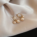 Gold Tone Hoop Earrings With Three Graduated Pearl Drops view 1