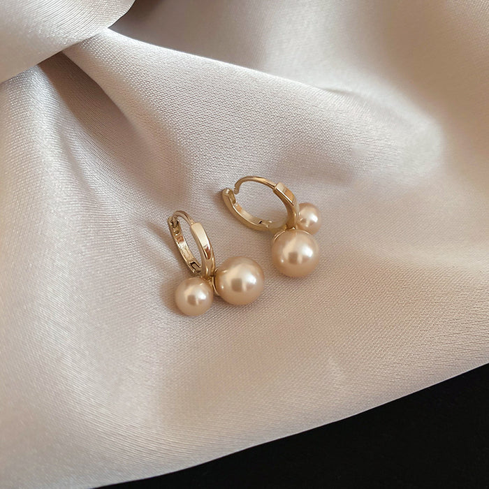 Gold Tone Hoop Earrings With Three Graduated Pearl Drops