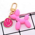 Gold Tone Balloon Dog and Smile Disc Clip Keychains view 7