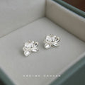 Silver Tone Textured Lotus Flower Stud Earrings Pair view 1