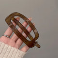 Large Translucent Open Oval Hair Pins In Light Tan Or Tea Brown view 7