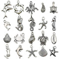 Gold-Tone Starfish and Shell Shell Charms with 26 Listed Options view 6