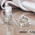 Silver Angel Wing Textured Huggie Hoop Earrings Pair view 5