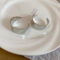 Wide Polished C Hoop Earrings in Gold and Silver Tone Finishes view 7