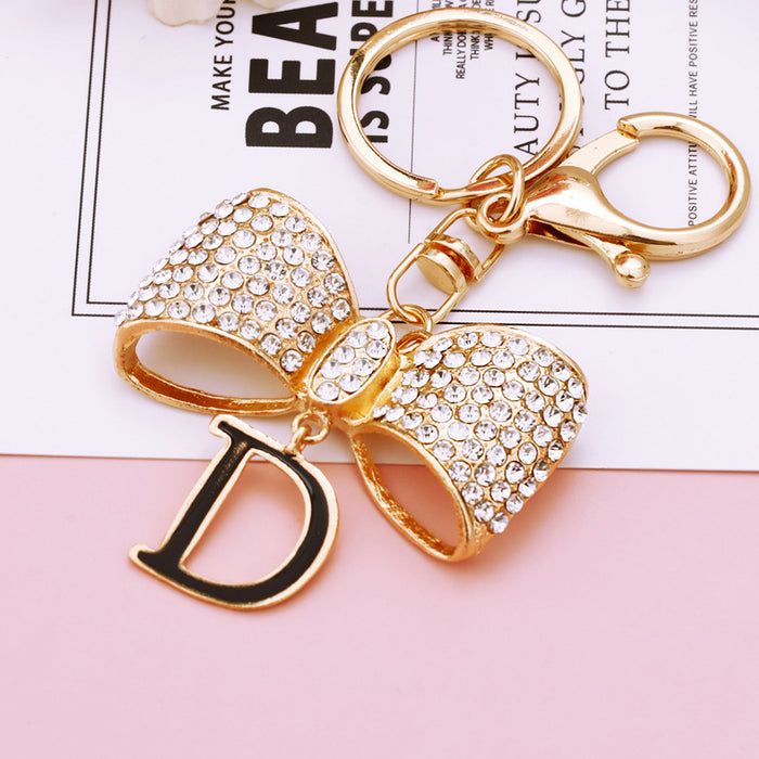 Mixed Letter D Bow and Pearl Mini Bow Keychains in Two Designs