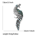 Crystal Peacock Metal Brooch with Curved Peacock Silhouette with Crystal Feather Details view 6