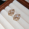 Openwork Quatrefoil Stud Earrings in Gold and Silver view 6