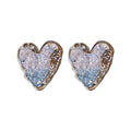 Silver Tone Heart Stud Earrings with Faceted Centers view 5
