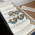 Silver Tone Cross Charm Huggie Hoops In Two Styles view 3