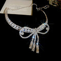 Silver Crystal Pearl Bow Necklace White Feather Tassel Earrings view 7