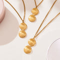 Spiral Disc Pendant Necklace and Triple Disc Drop Earrings view 3