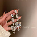 Clear Crystal Heart Long Dangle Statement Earrings view 1