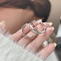 Twisted Multi Band Small Hoop Earrings in Gold and Silver view 3
