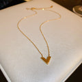 Gold Tone V Pendant Necklace Or Matching Stud Earrings view 7