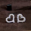 Silver Tone Open Heart Clear Pave Stud Earrings Pair view 1
