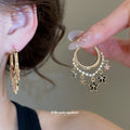 Gold Star Charm Huggie Hoop Earrings Statement Jewelry Design view 3