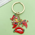Gold-Tone Keychain with Four Red Chili Pepper and Lips Charms view 3