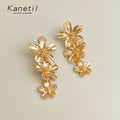 Gold Cascading Triple Flower Long Drop Earrings Pair view 3