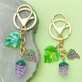 Strawberry, Cherry and Lemon Charm Keychains Featuring Purple Grape Across 43 Variations view 3