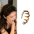 Wavy Tooth Comb Headband In Brown Tortoiseshell Or Glossy Black view 2