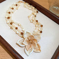 Multi-Strand Cream Bead Flower Necklace and Earrings view 6