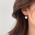 Pink Heart Charm Huggie Hoop Earrings in Gold Tone view 4