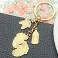 Eight Pink Baby Outfit and Footprint Metal Keychain Designs view 4