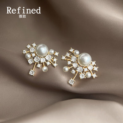 Gold pearl clear starburst cluster studs on taupe satin