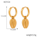Gold Huggie Hoop Earrings with Cowrie Shell Dangle Charms view 6