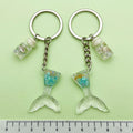 Starfish, Shell and Mermaid Charm Keychains Featuring Flower Across 29 Pictured Variations view 4