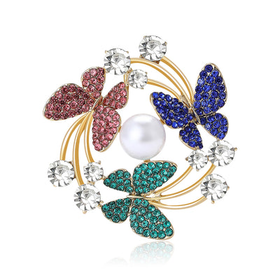 Main front view of Butterfly Wreath Brooch With Pearl Center In Three Colorways