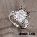 Rectangular Clear Solitaire Three-Stone Ring In Ten Metal Tones view 4