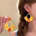 Woven Flower Hoop Drop Earrings in Yellow and Blue Colorways view 6