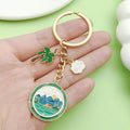Flower Charm Keychains Featuring Camera Camp Across 5 Pictured Variations view 3