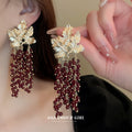 Red Beaded Grape Cluster Leaf Drop Earrings with Polished Metal Accents view 3