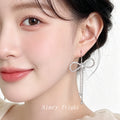 Silver Rhinestone Bow Dangle Earrings Dual Crystal Chains view 2