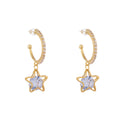 Gold Tone Clear Star and Stone Huggie Hoop Earrings view 5