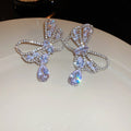 Silver Tone Crystal Bow Necklace And Earrings With Teardrop Drops view 6