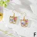 Gold Tone Pressed Flower Butterfly Drop Earrings in Twelve Designs view 9