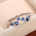 Silver Tone Blue Irregular Bezel Bubble CZ Finger Ring view 4