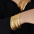 Gold Open Cuff Bangles Heart Oval Braid Scale Designs view 4