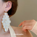 Long White Shell Like Cluster Drop Earrings With Gold Tone Links view 3