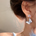 Translucent Blue Butterfly Stud Earrings With Crystal Centers view 2