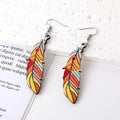 Silver Tone Western Cow Skull and Feather Acrylic Hook Earrings view 4