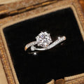 Round Clear Solitaire Sweeping Crossover Ring In Silver Tone view 2