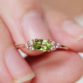 Olive Oval Three-Stone Ring In Rose And Silver Tones view 3