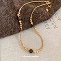 Gold Tone Beaded Necklace With Brown Round Accents view 2