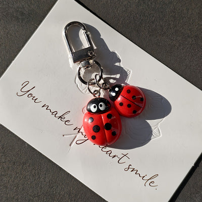Main product view of red Double Ladybug Charm with Silver Tone Lobster Clasp